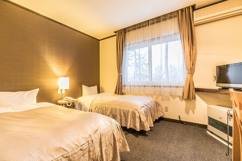Petit Hotel Enchante Hakuba Bagian luar foto