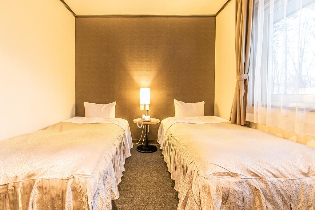 Petit Hotel Enchante Hakuba Bagian luar foto